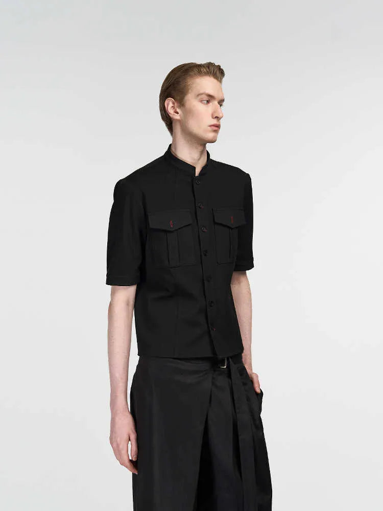 Handmade black loose fit half sleeve men's shirt with a shirt collar.