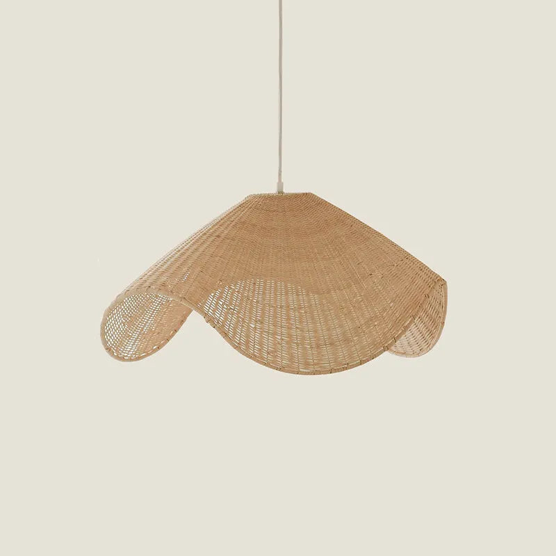 Handmade natural bamboo rattan pendant light chandelier with a woven lampshade emitting a warm glow.