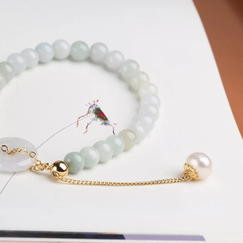 Jade bracelet with emerald peace buckle charm and pearl pendant in geometric national style design