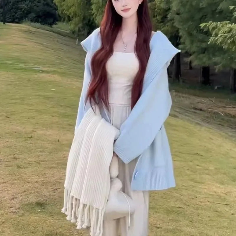 Sleeveless Ice Silk knitted cardigan with princess sleeves and button front, shown in available colours and sizes S to 2XL.