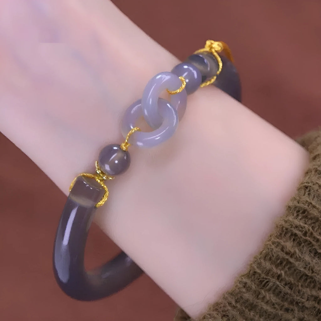 Grey retro style women's bracelet made from smoke purple agate with a ring buckle fastening.