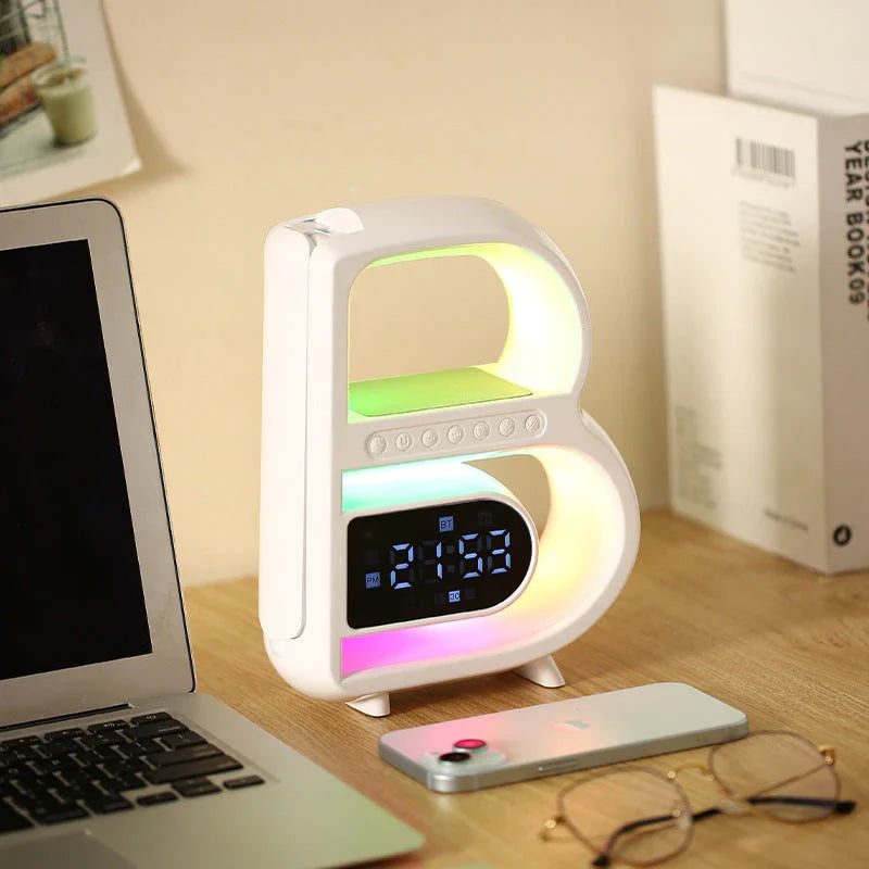 B-shaped Bluetooth desk lamp with wireless charging, adjustable lighting, and alarm clock features