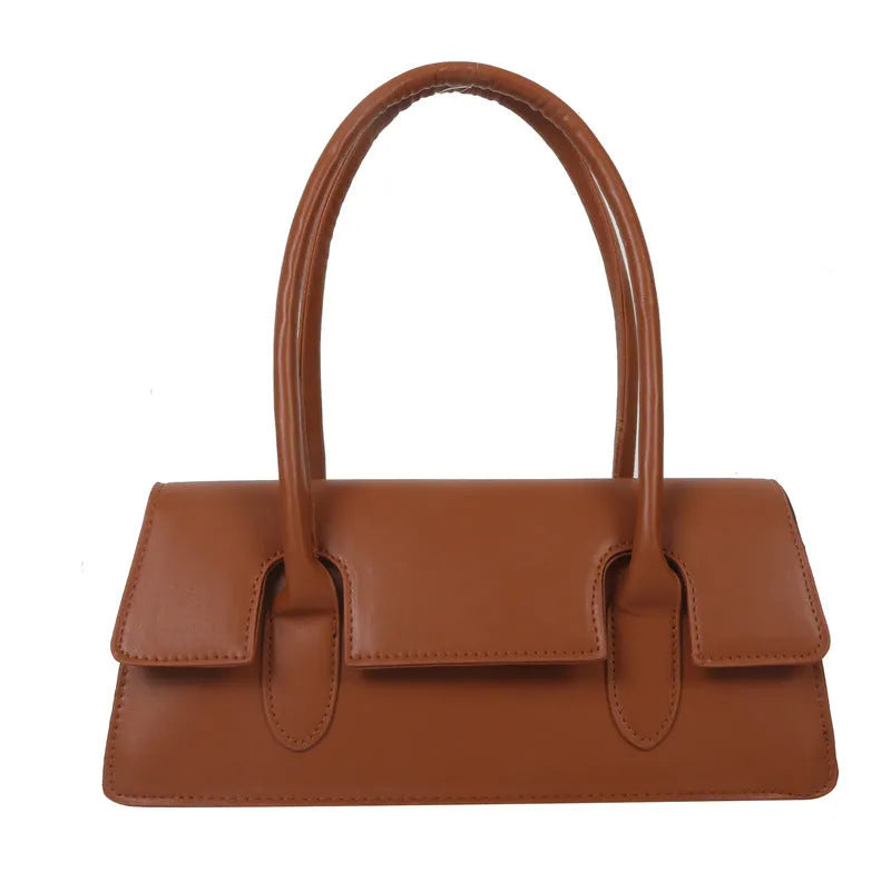 Women's square shoulder bag in black with stitching detail and single shoulder strap