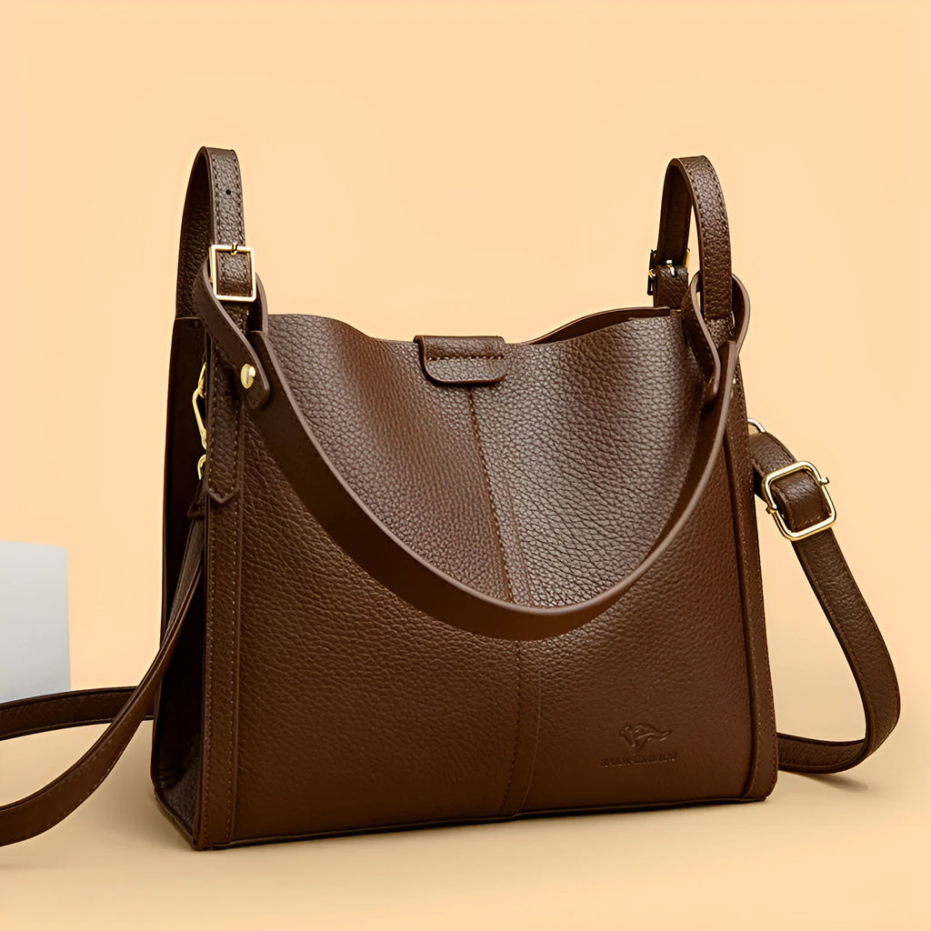 Brown PU women's shoulder bag with single strap and multiple interior compartments
