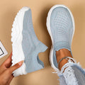 Light blue women's mesh slip-on shoes with round toe and mid heel
