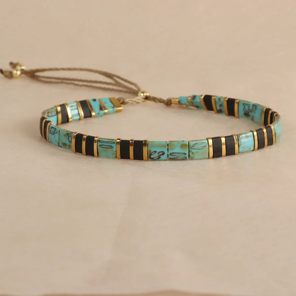Geometric glass beaded bracelet with pull beads in five colour options