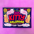 Cat calendar wall planner showing monthly layouts for 2024 and 2025 models