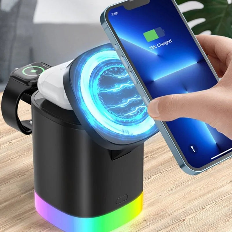Black foldable 3 in 1 wireless charging station showing phone, watch, and earbuds charging simultaneously with RGB light
