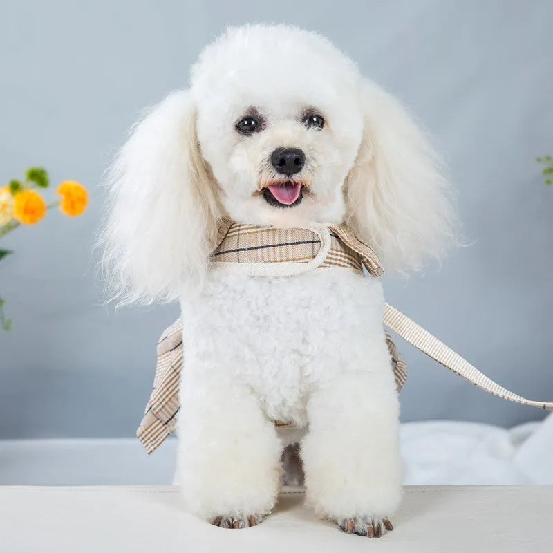 Pet walking vest with chest strap and hand holding rope in polyester fabric, available in milky white or purple colours
