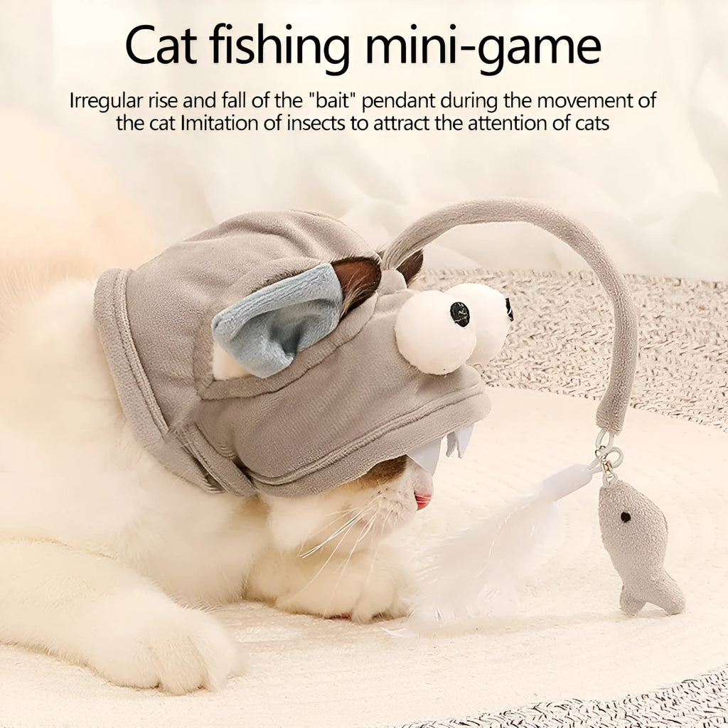 Grey head-mounted cat toy with feather and big-eye fish attachments on adjustable elastic band