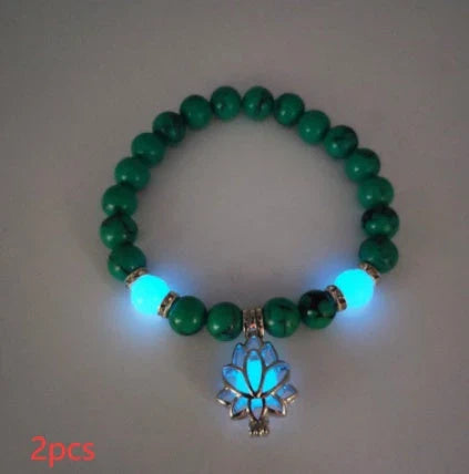 Luminous lotus charm bracelet with mesmerizing glow-in-the-dark beads, made of premium alloy and turquoise fluorescent stone