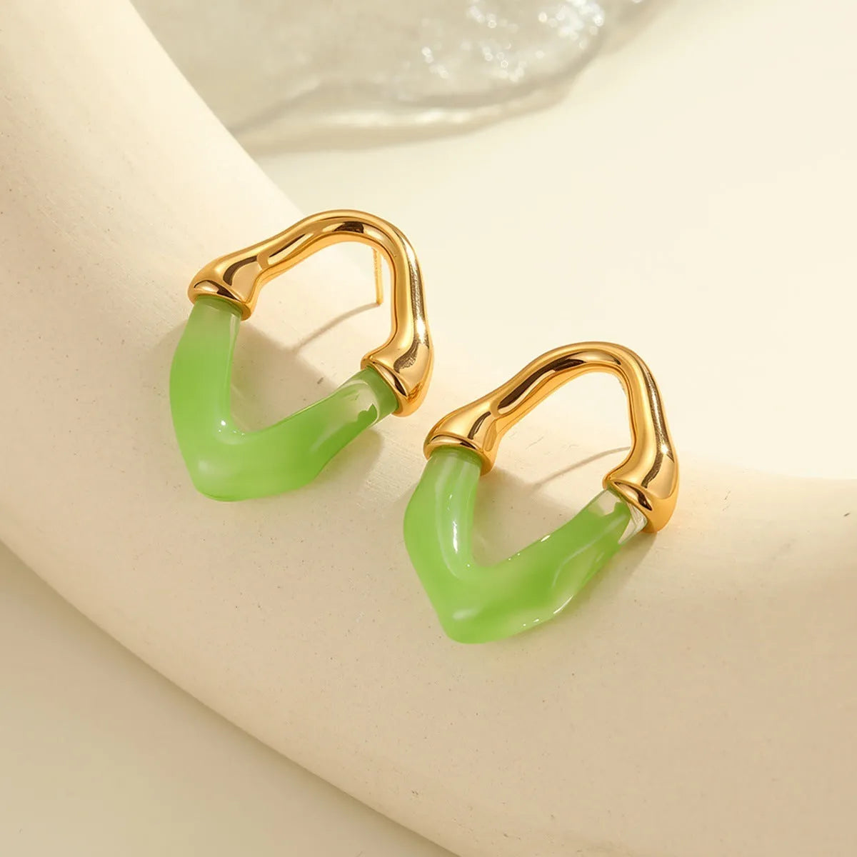 Women's stainless steel drop earrings with colour resin stitching and 18K electroplated finish in pink option