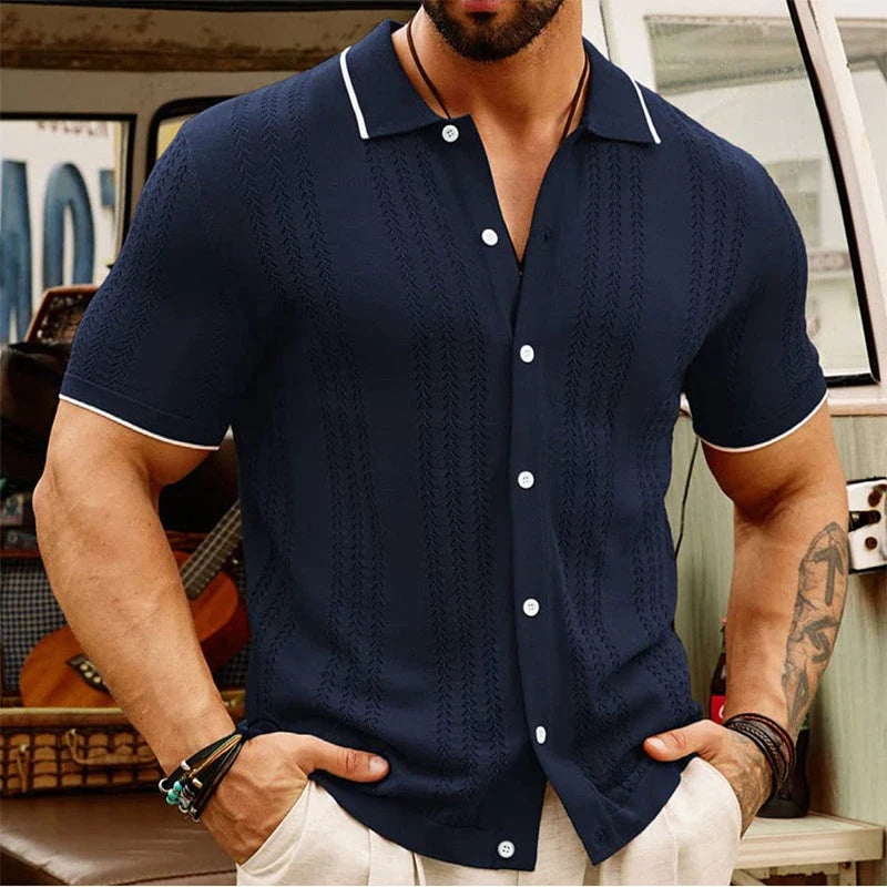 Short-sleeve polo shirt in brown, navy blue, and khaki colors with unique flocked design and regular fit