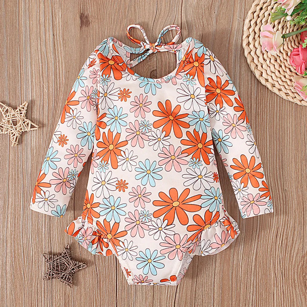 Girl's floral print open back swimsuit in orange red with crew neckline and Asian-fit sizing