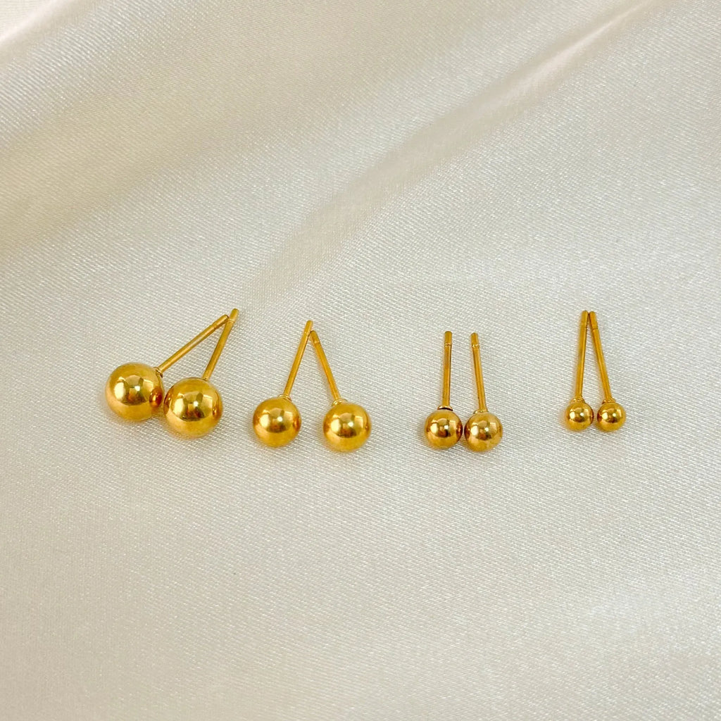 Stainless steel ball stud earrings with geometric round design in gold and silver finishes