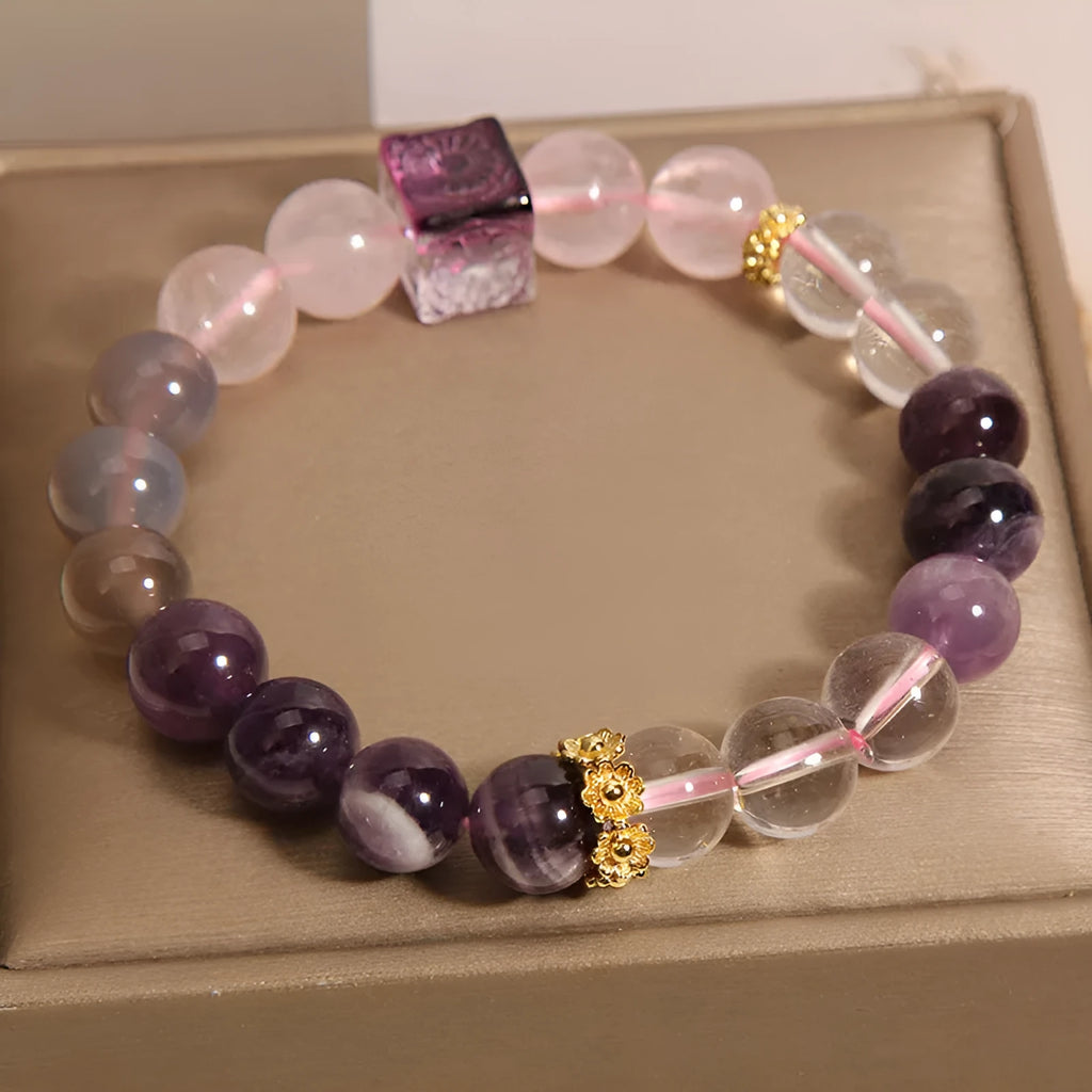 Purple women's amethyst crystal bracelet with rhinestone details showing 10mm size