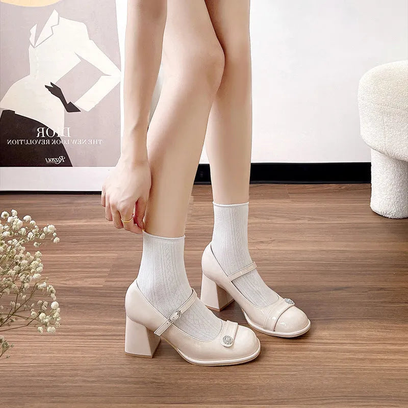 Women's black patent leather chunky heel shoes with round toe and buckle closure for wide feet