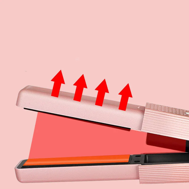 Compact pink cordless USB hair straightener and curler with ceramic plates on a white background.