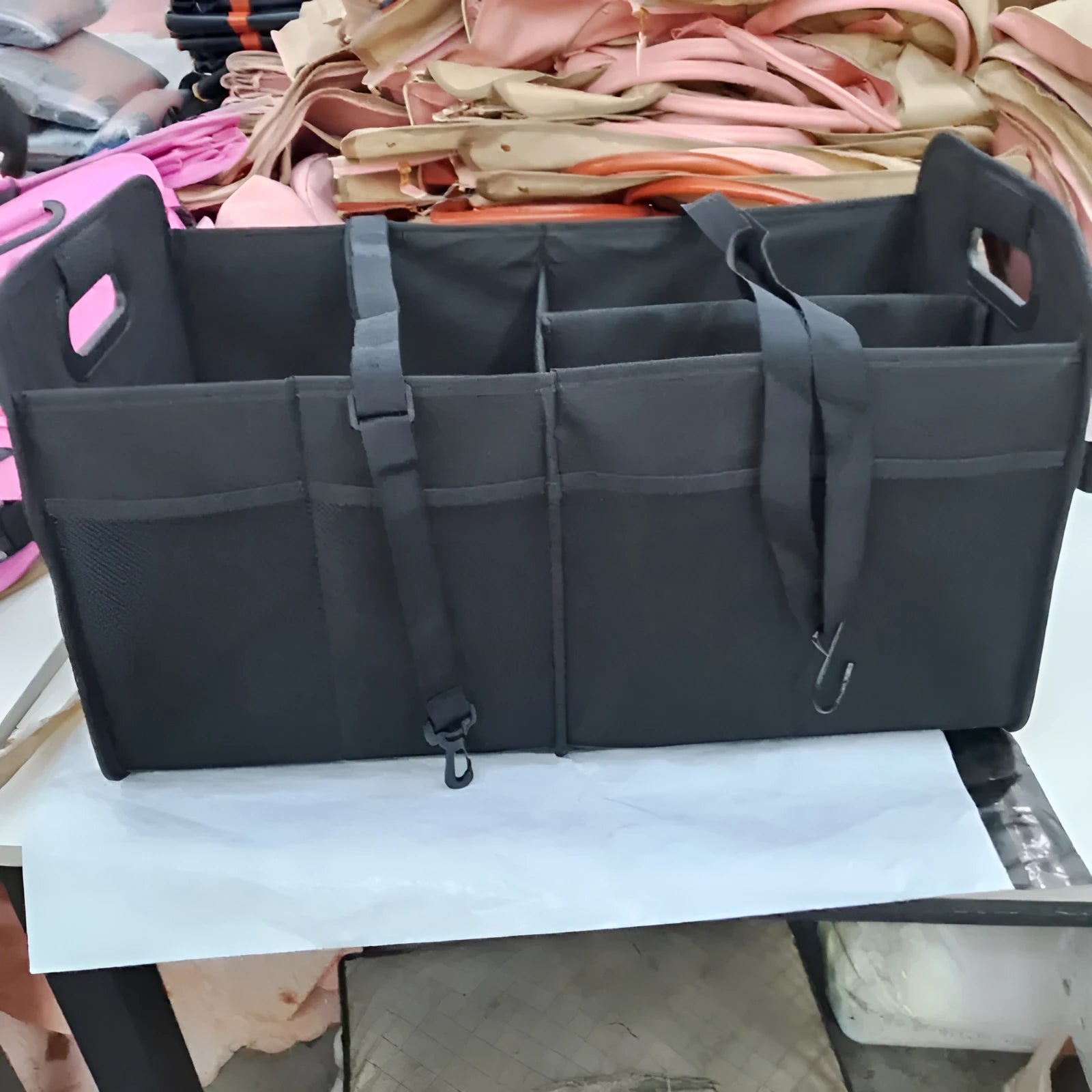 Black foldable fabric car boot storage box with handle and multiple compartments