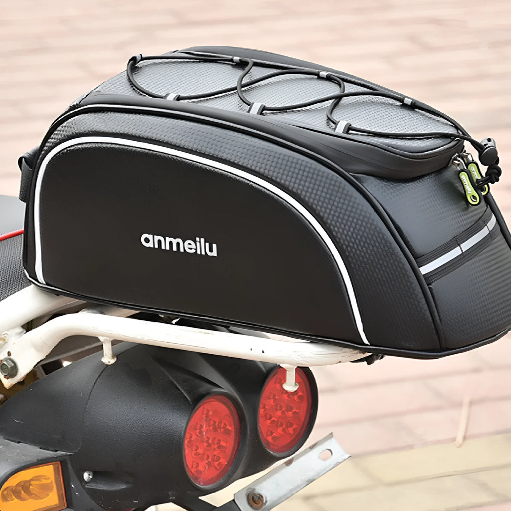Waterproof black PU leather bicycle pannier bag mounted on a bike rear rack.