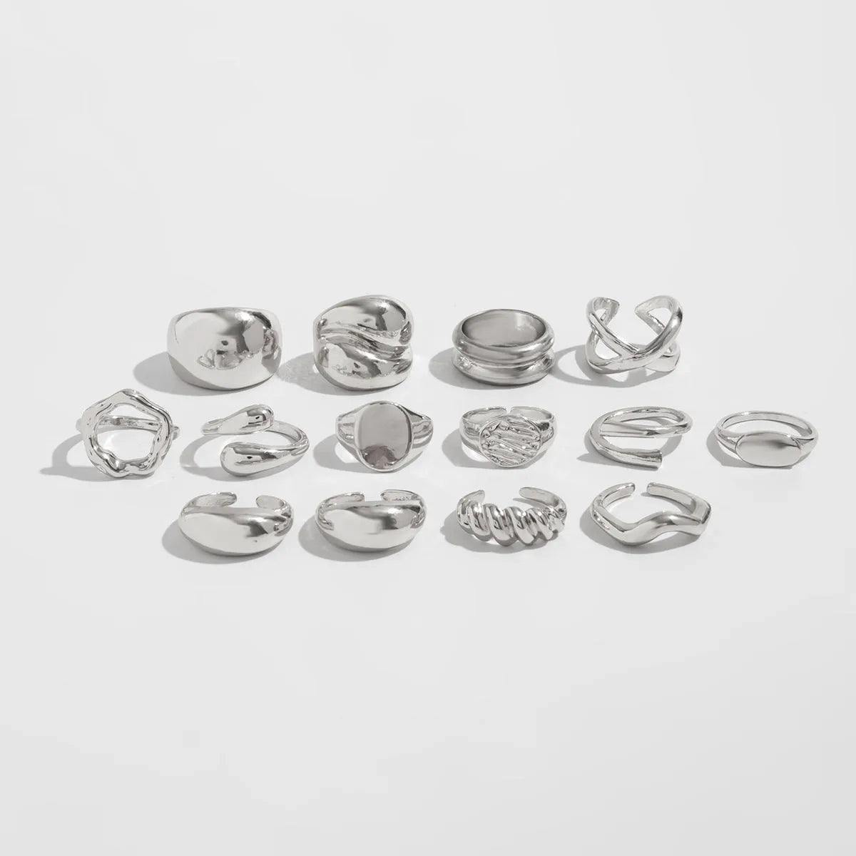 14 piece adjustable geometric ring set in Gold or White K with open-mouth alloy bands