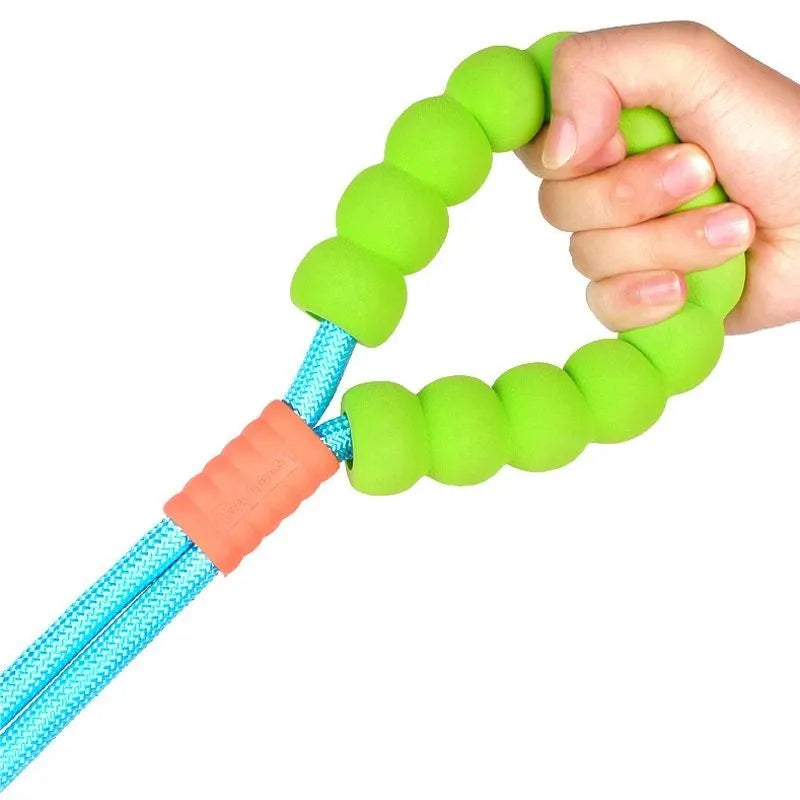 Nylon dog traction leash with a black foam handle on a coloured rope.