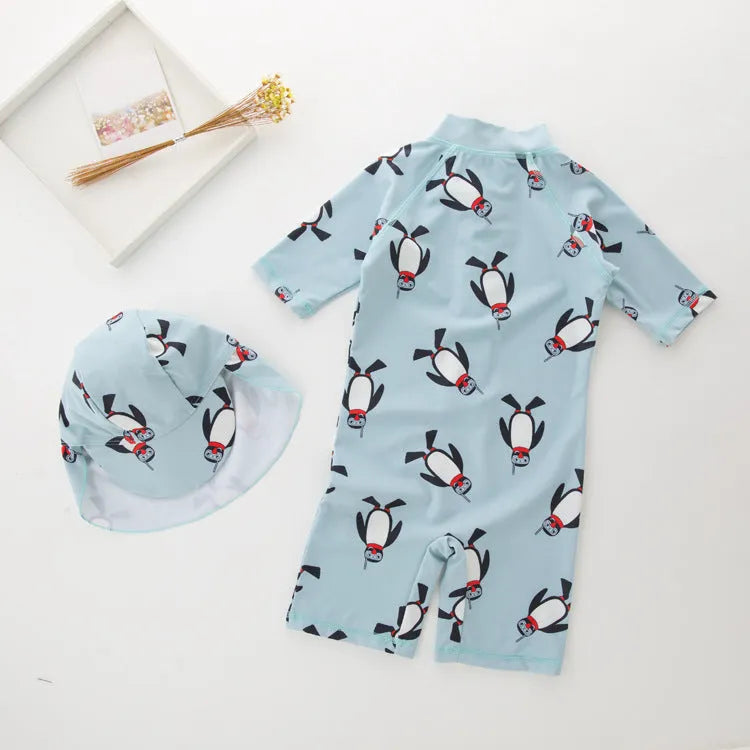 Boy's long sleeve penguin print swimsuit two-piece set with matching swimming cap