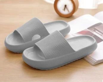 Cozy home slippers with soft fabric uppers and durable EVA soles for comfortable indoor and outdoor wear