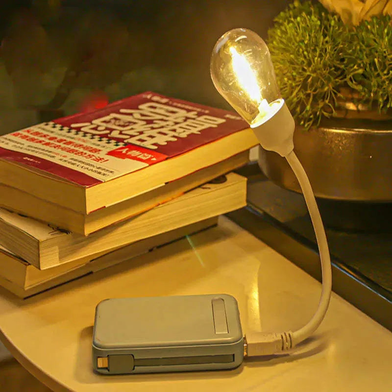 USB rechargeable folding tungsten night light with S14 bulb showing collapsed and extended positions