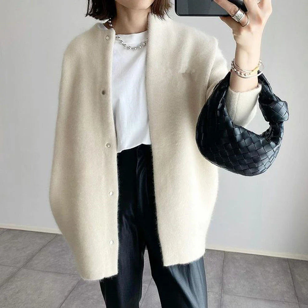 A cozy, stylish knitted cardigan jacket in a variety of colors for women's autumn and winter fashion