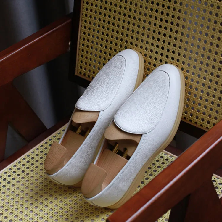British handmade men's leather loafers in various colours showing full grain upper and TPR sole.