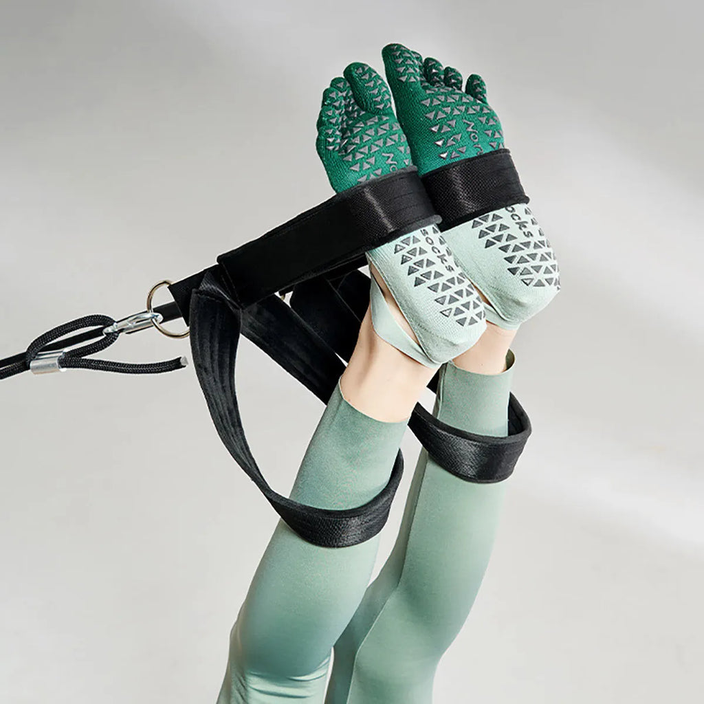 Grippy yoga socks for women and men, non-slip full toe, available in green, pink, purple, white, and black.
