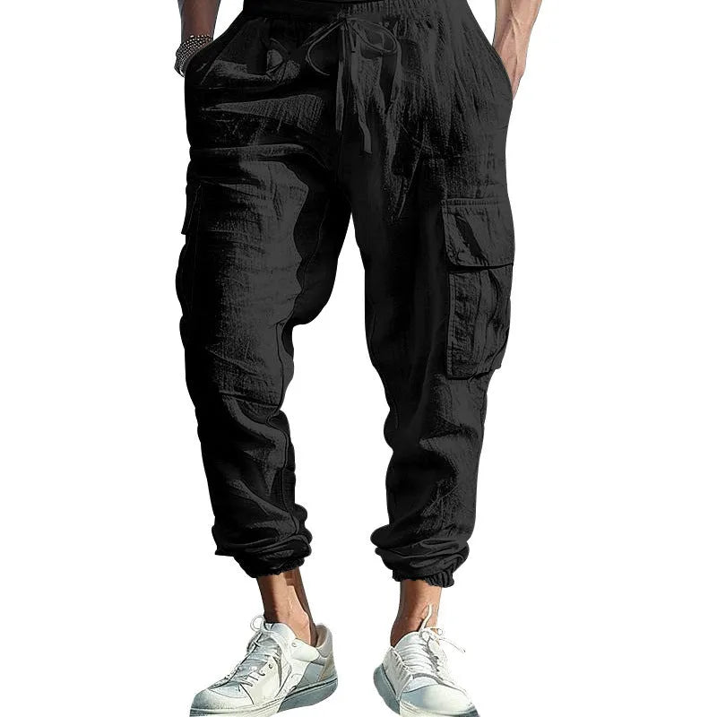 Men's linen casual trousers with ankle ties and multiple pockets in solid colour