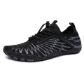 Lace-up outdoor sports shoes in various colours with rubber soles and breathable construction