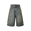 Distressed raw edge denim shorts in straight leg cut, shown in light blue.