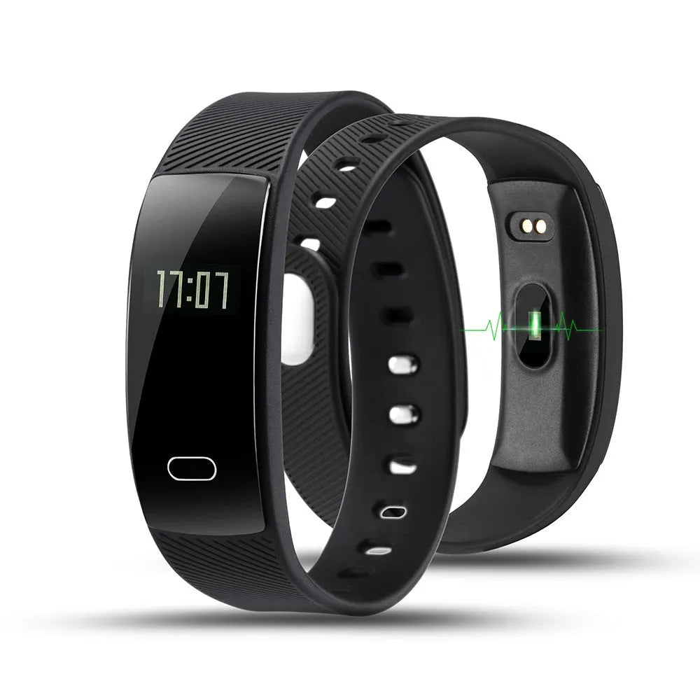 Black smart health bracelet with OLED display showing blood pressure reading on a wrist.