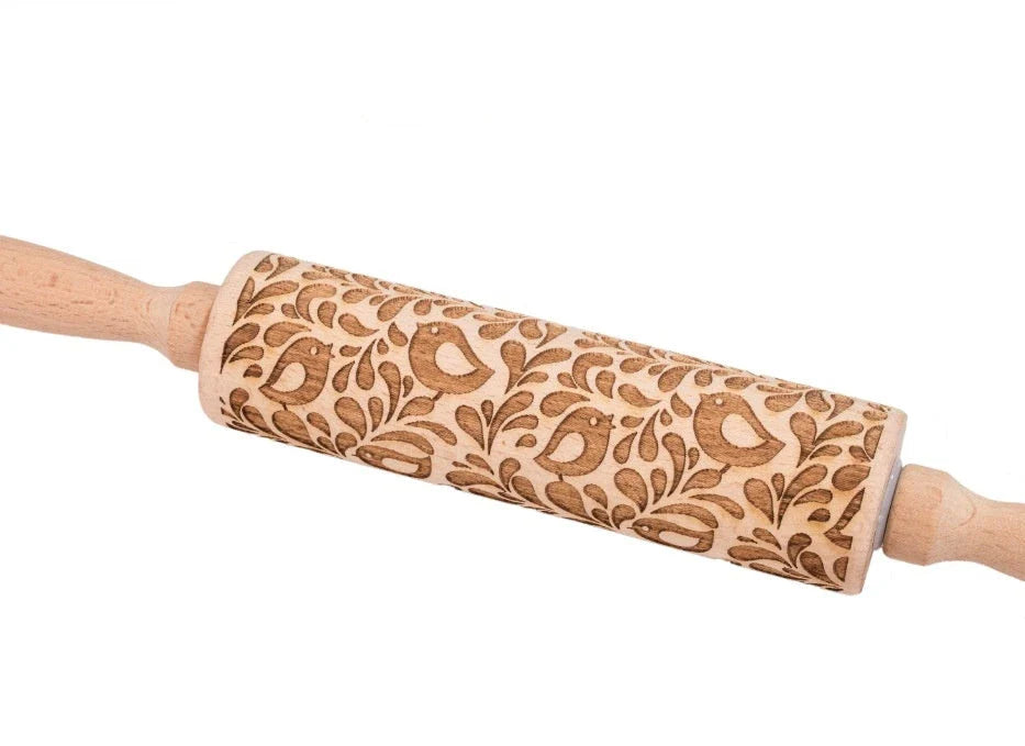 Personalized Christmas rolling pin with a variety of embossed holiday designs, including snowflakes, reindeer, and Merry Christmas patterns