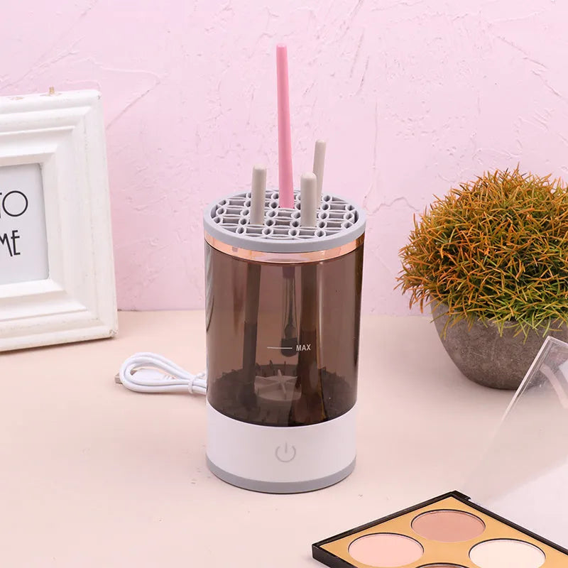 Grey and white portable electric makeup brush cleaner with USB charging cable