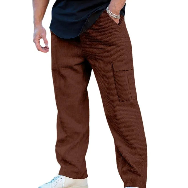 Men's corduroy cargo trousers in navy blue with straight-leg wide-cut design and drawstring waist