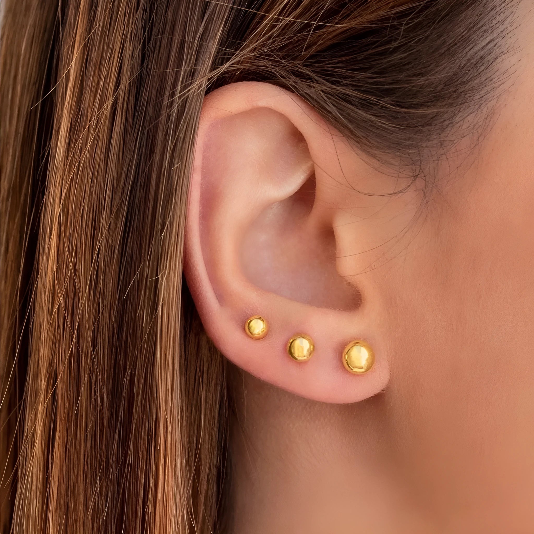 Stainless steel ball stud earrings with geometric round design in gold and silver finishes