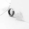 Silver geometric earrings with circular striped design in titanium steel