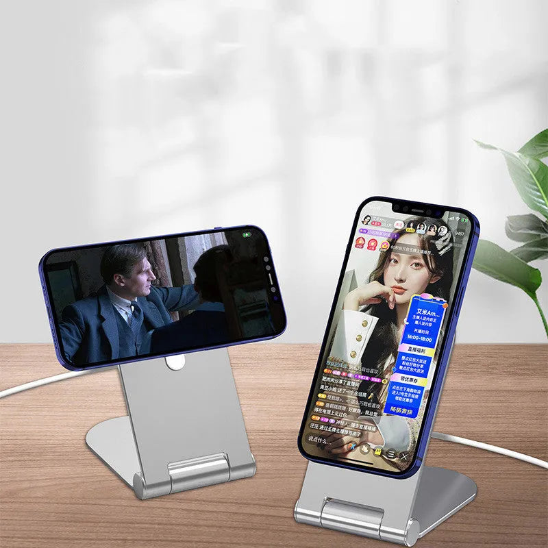 Silver aluminium alloy magnetic bracket holder for iPhone 12 smartphones showing adjustable vertical mounting design
