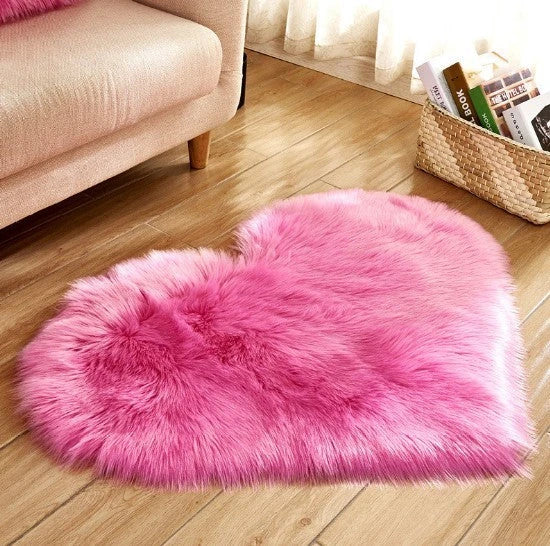 Soft and plush heart-shaped rug in various colors, perfect for cozy home decor