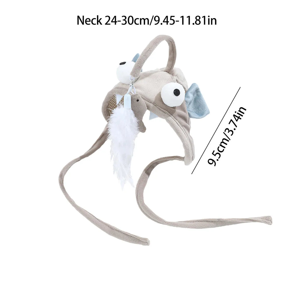 Grey head-mounted cat toy with feather and big-eye fish attachments on adjustable elastic band