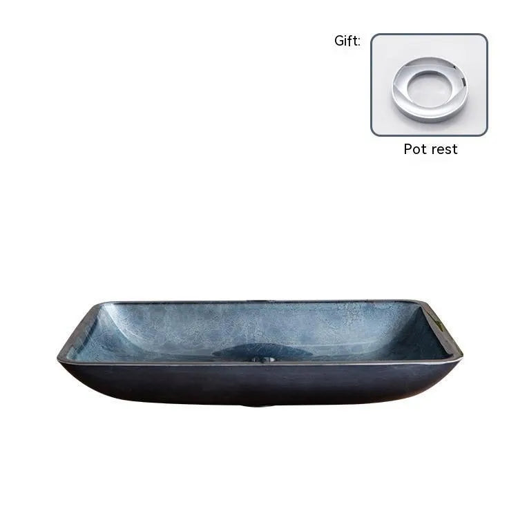 Modern blue-grey tempered glass table basin with a simple design for bathroom vanity units.