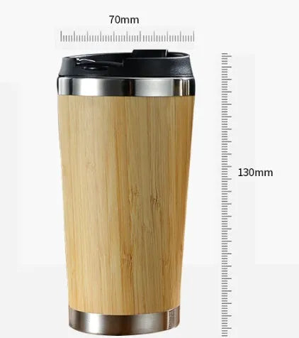 Bamboo insulated travel coffee cup with lid, showing anti-slip base pad, 420ml capacity.