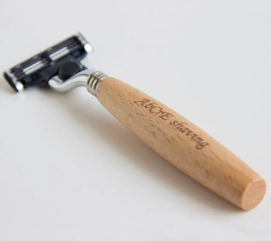 Men's manual shaving set with beech handle razor, bristle brush, stainless steel soap bowl, and metal stand