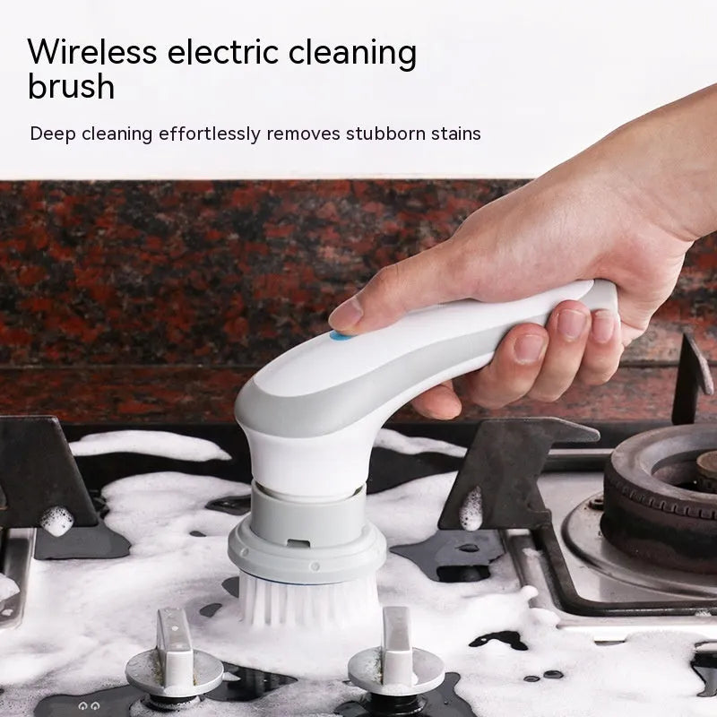 White cordless electric cleaning brush with multiple brush heads on storage bracket