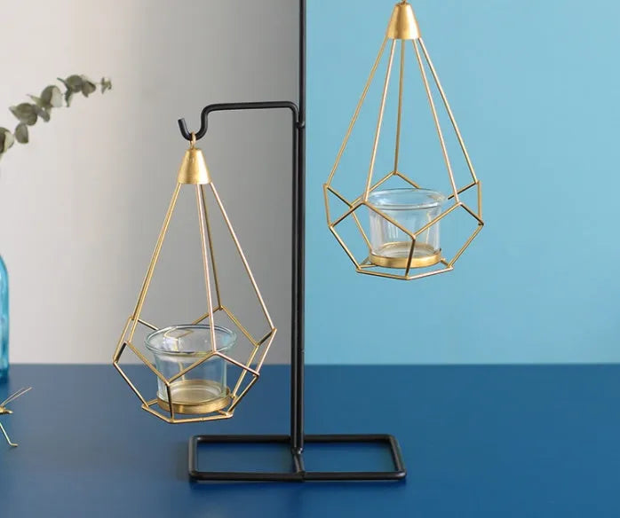 Iron candle holders for block candles in six Nordic styles: single, double, triple, triangle, rectangular.