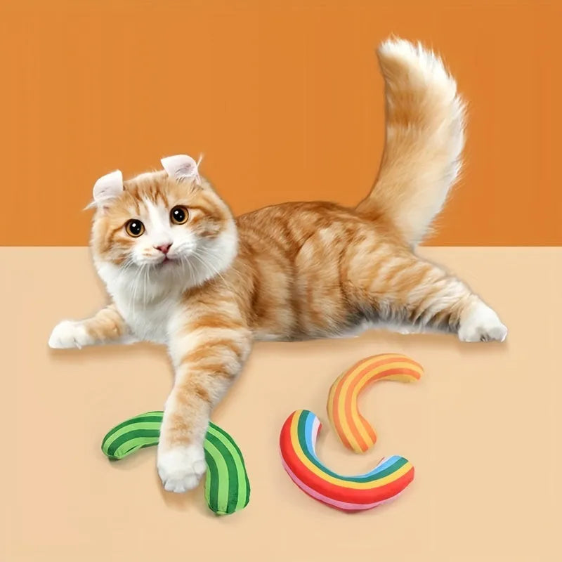 Cat toy set with striped pattern pillows and noise toys containing catnip in green, rainbow and yellow colours